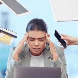 A woman with her head in her hands