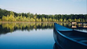 A canoe floats on calm water