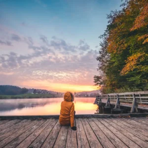 Person practicing mindfulness and acceptance for mental well-being.