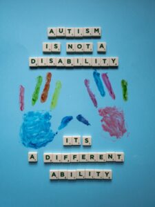 Text graphic stating "Autism is not a disability