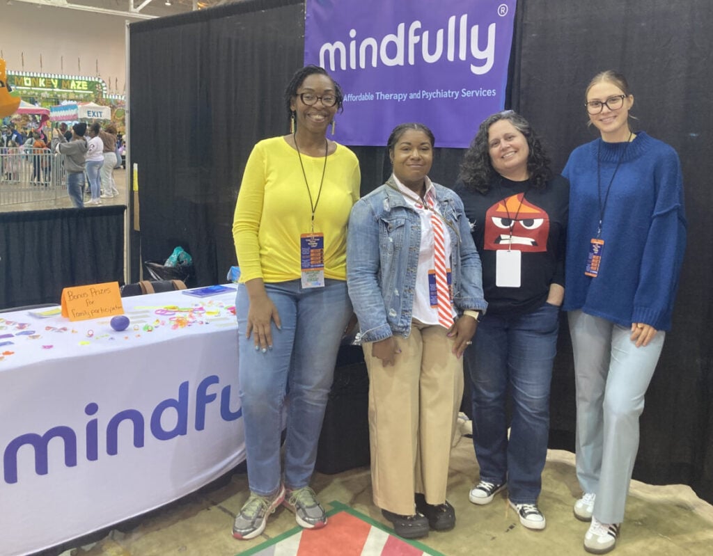 Shirley Wells, Associate Director, and some members of the Mindfully Strongsville Therapy team at an outreach event in Cleveland, Ohio