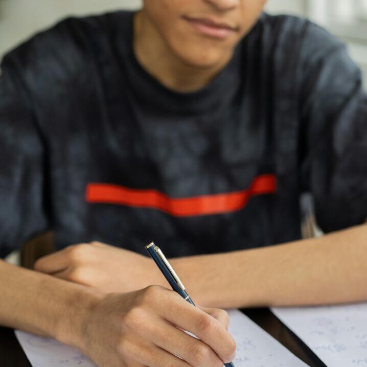 Teen studying after successful treatment of ADD with medication