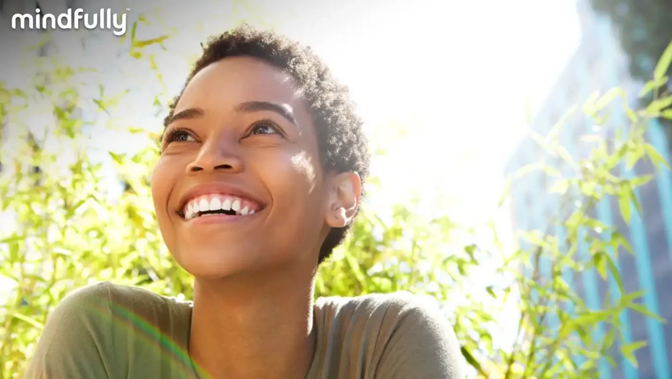 Individual practicing techniques and strategies to boost and enhance self-esteem.