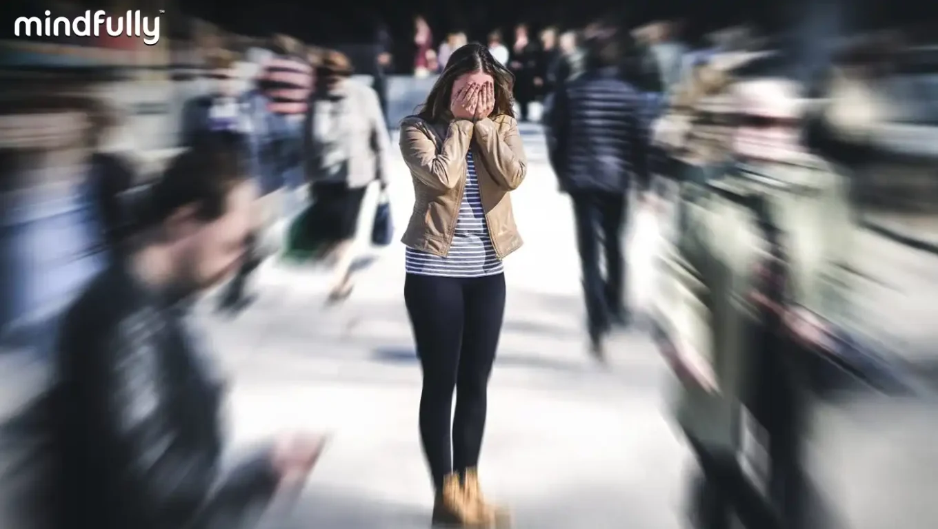 A woman walks through a crowded area