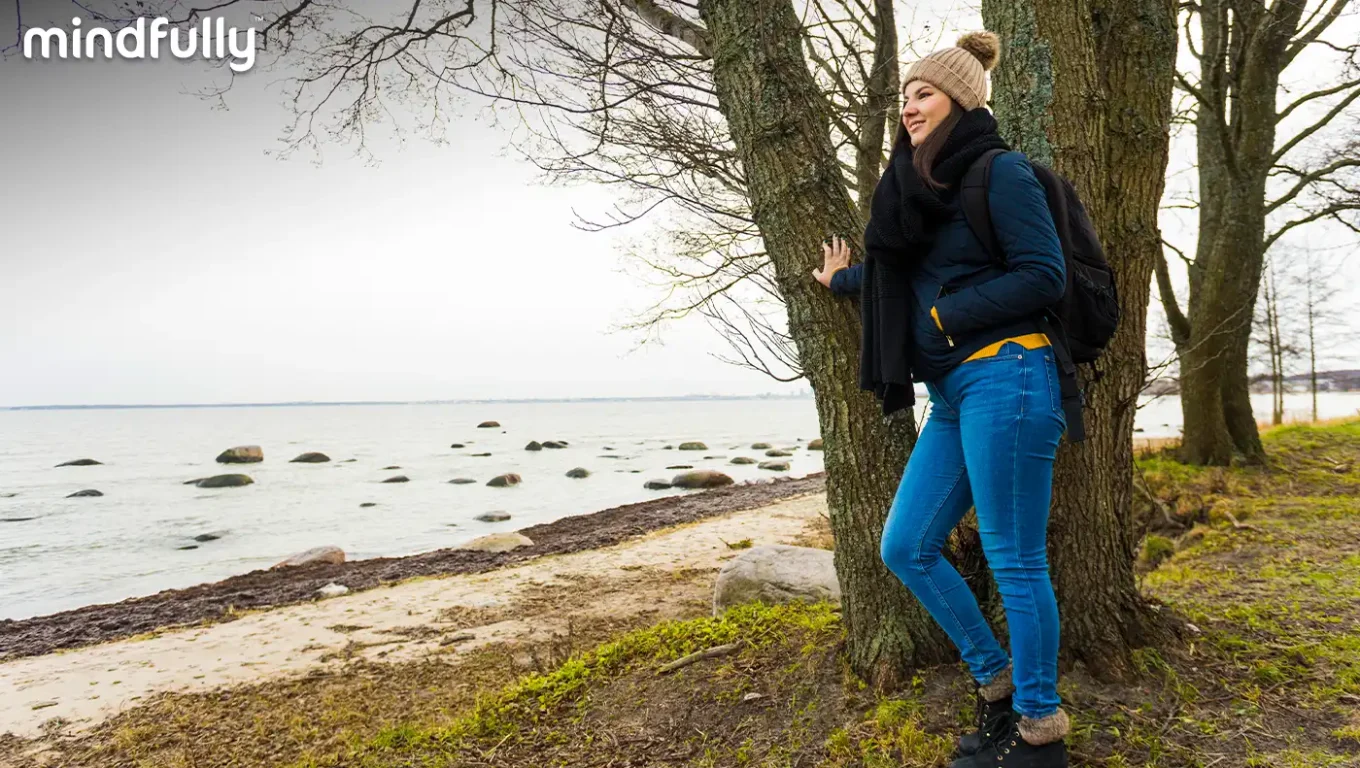Person enjoying an energizing activity outdoors