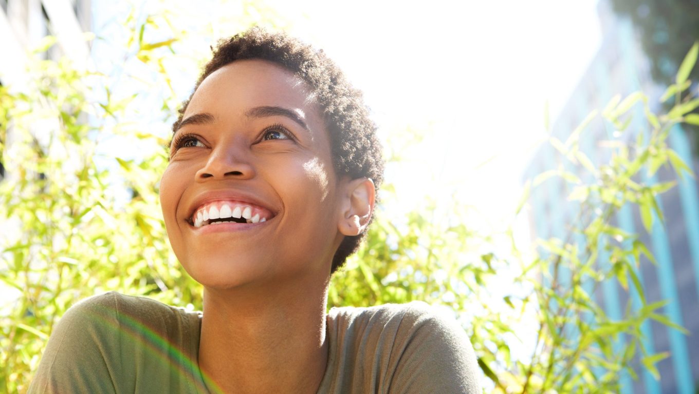 Individual practicing techniques and strategies to boost and enhance self-esteem.