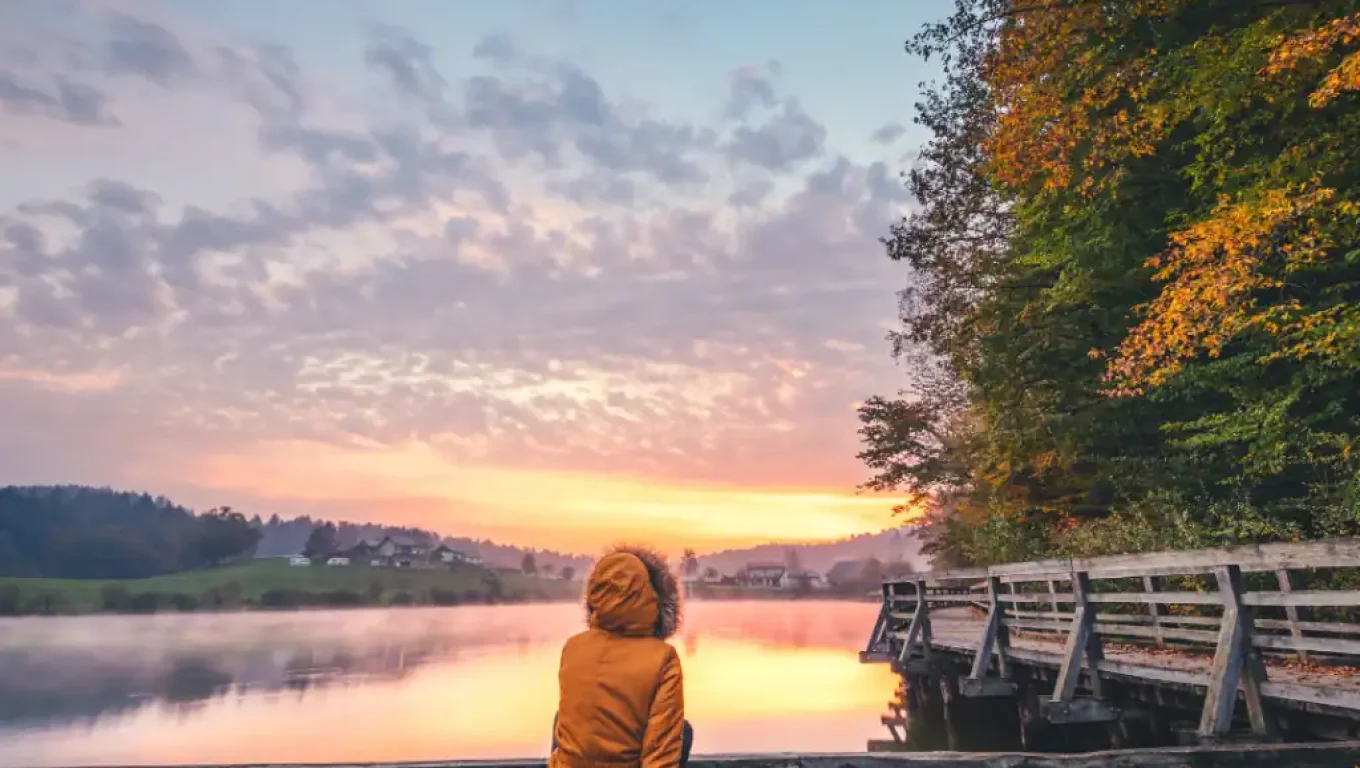 Person practicing mindfulness and acceptance for mental well-being.