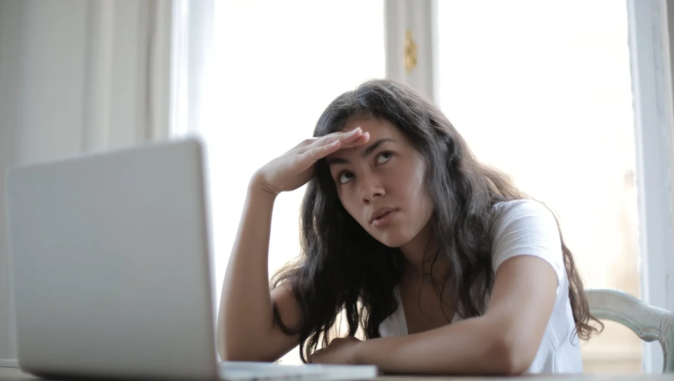 Person managing negative emotions and annoyance with effective coping strategies.